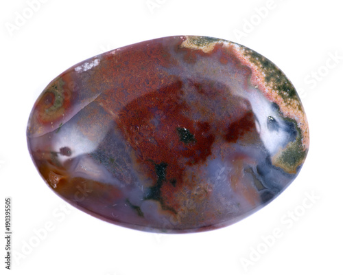 Polished ocean jasper palm stone from Madagascar isolated on white background photo