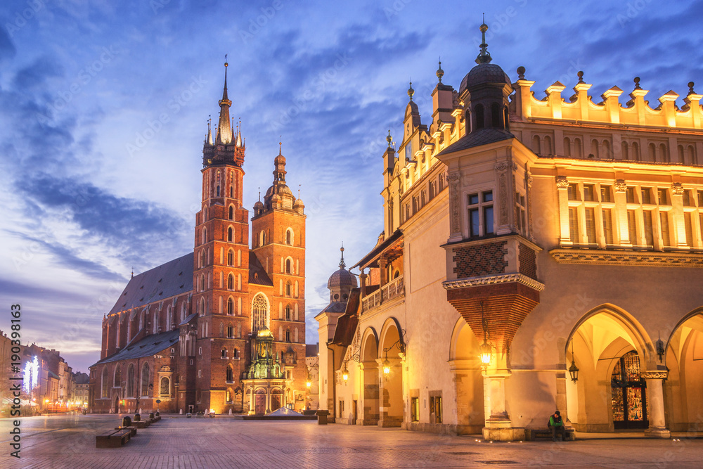 Fototapeta premium Cloth Hall and St Mary s Church at Main Market Square in Cracow, Poland