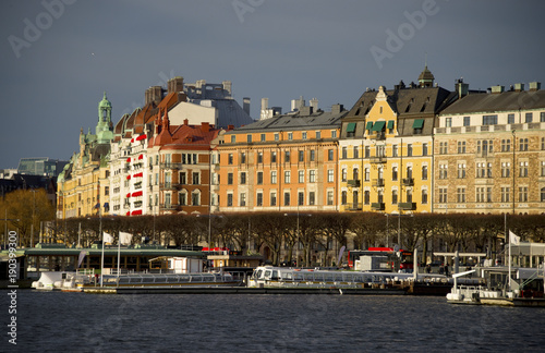 Photography Houses at the pier of northern Stockholm in mid winter sun