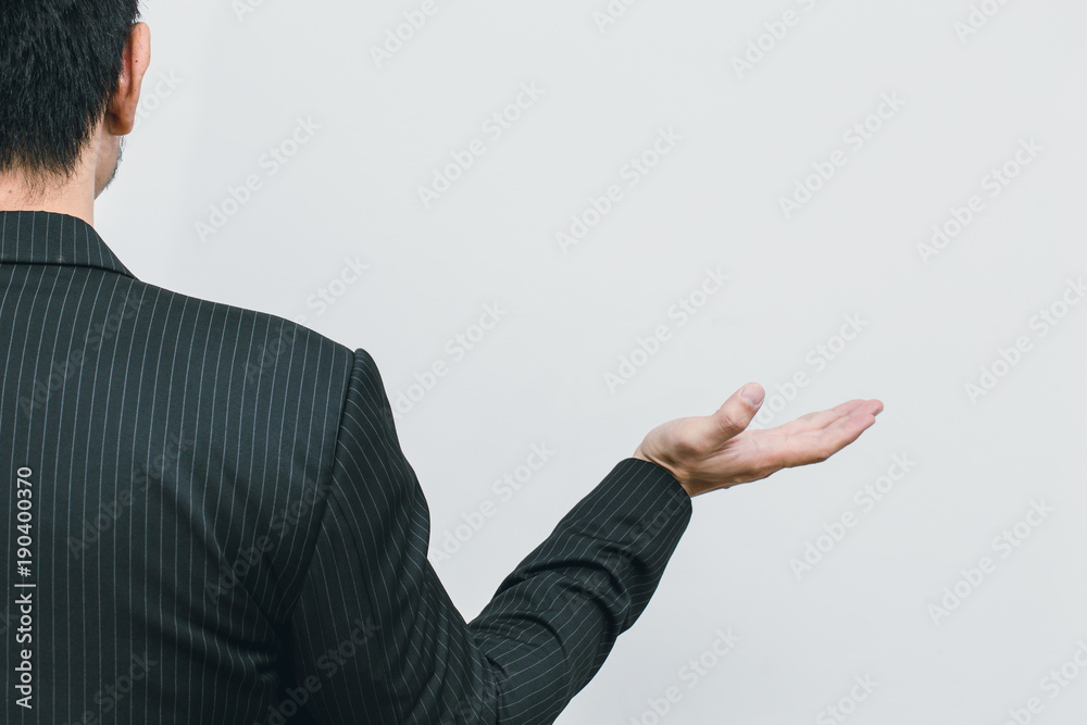 Asian business man open palm like present something on white space Asian business man open palm like present something on white space