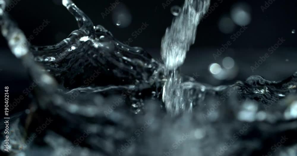 Super slow motion rain drops close up shot on Phantom Flex 4K