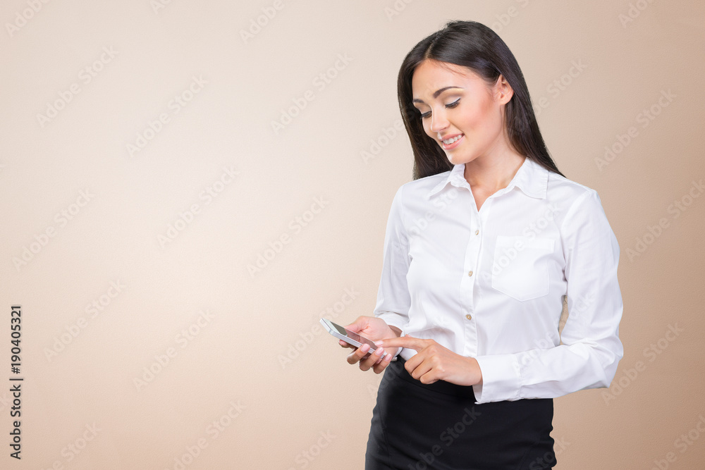 Young elegant woman talking on mobile phone Young elegant woman talking on mobile phone