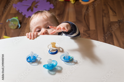 baby looking for pacifier