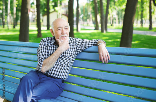 Pensive senior man outdoors © Prostock-studio