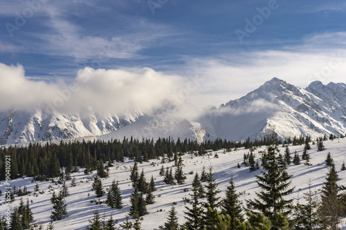 Great peaks of the Tatra Mountains in winter scenery.