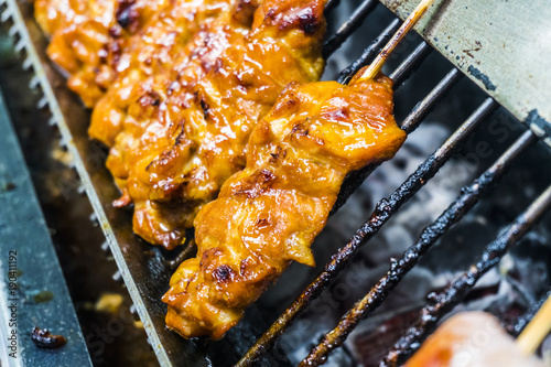 Chicken on skewers at a street food stall