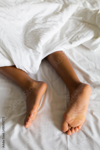 Girls feet in bed 