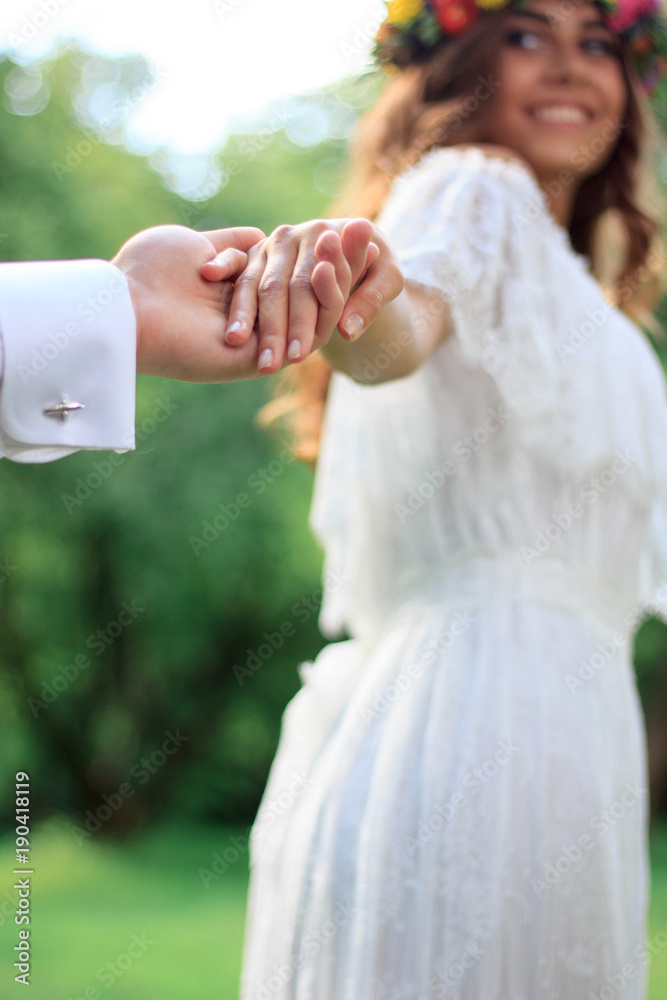 Go with me! young woman carry away a man. Go with me! young woman carry away a man.