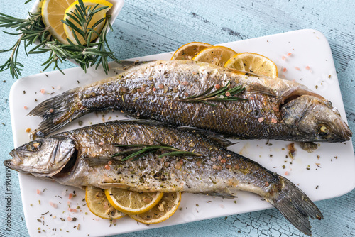 Baked sea bass with lemon and rosemary