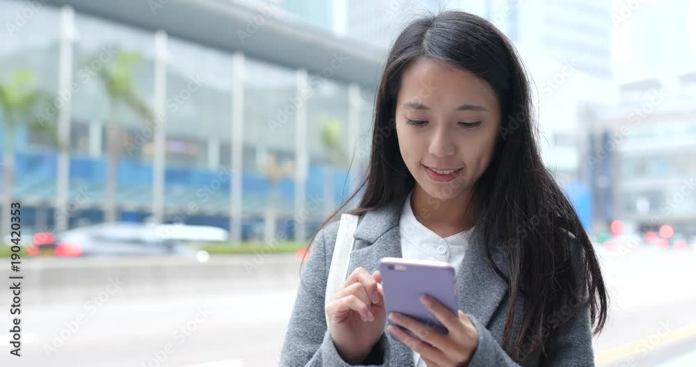 Young Business woman use of mobile phone at outdoor