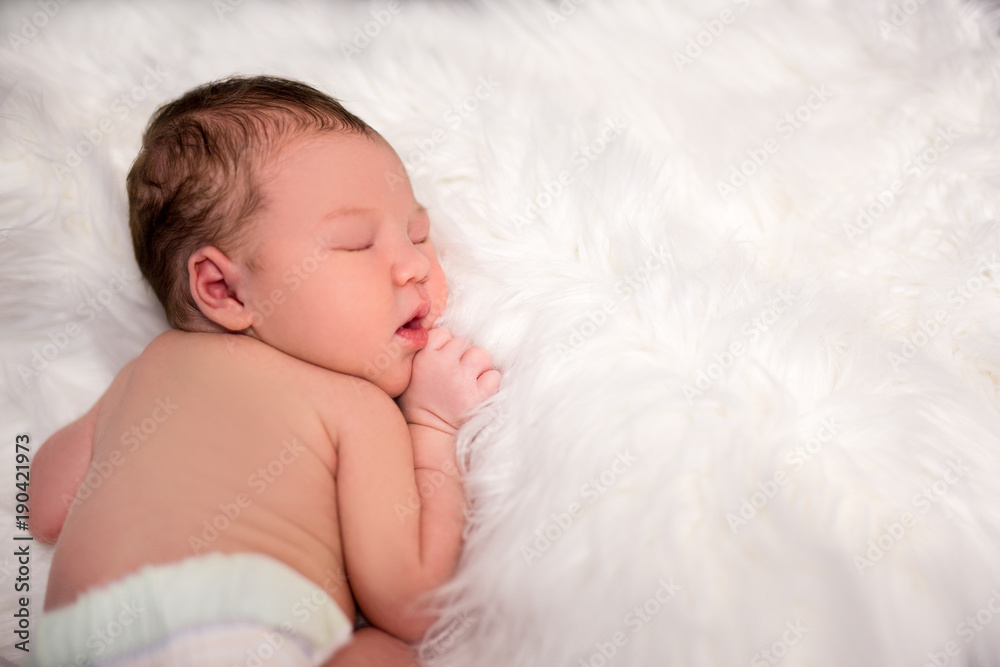 close up portrait of cute sleeping newborn baby and copy space over white close up portrait of cute sleeping newborn baby and copy space over white