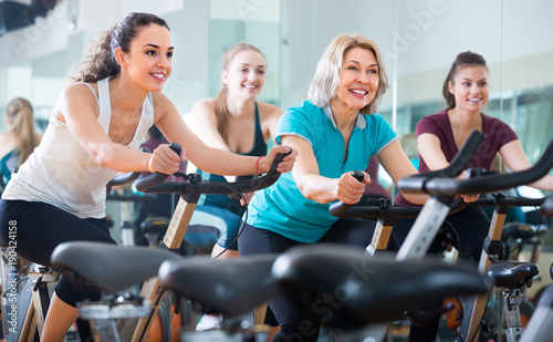 Females cycling in sport club .