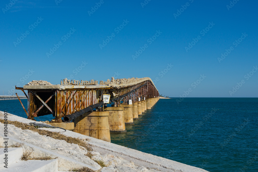USA, Florida, Rusty ancient railroad bridge over the ocean on the florida keys USA, Florida, Rusty ancient railroad bridge over the ocean on the florida keys