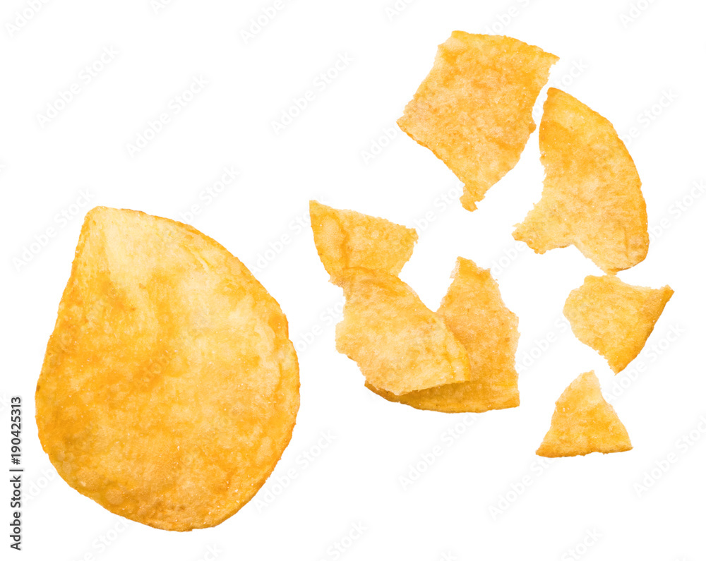 broken potato chips isolated on white background, top view