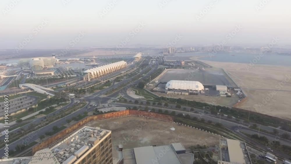 ABU DHABI, UAE - DECEMBER 2016: Aerial view of Yas Island buildings. Abu Dhabi attracts 10 million people annually ABU DHABI, UAE - DECEMBER 2016: Aerial view of Yas Island buildings. Abu Dhabi attracts 10 million people annually