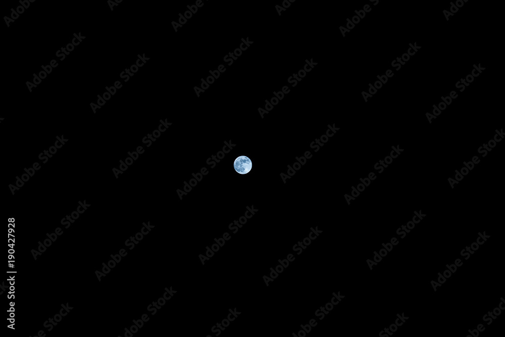 Lonely moon. The moon on the black sky Lonely moon. The moon on the black sky