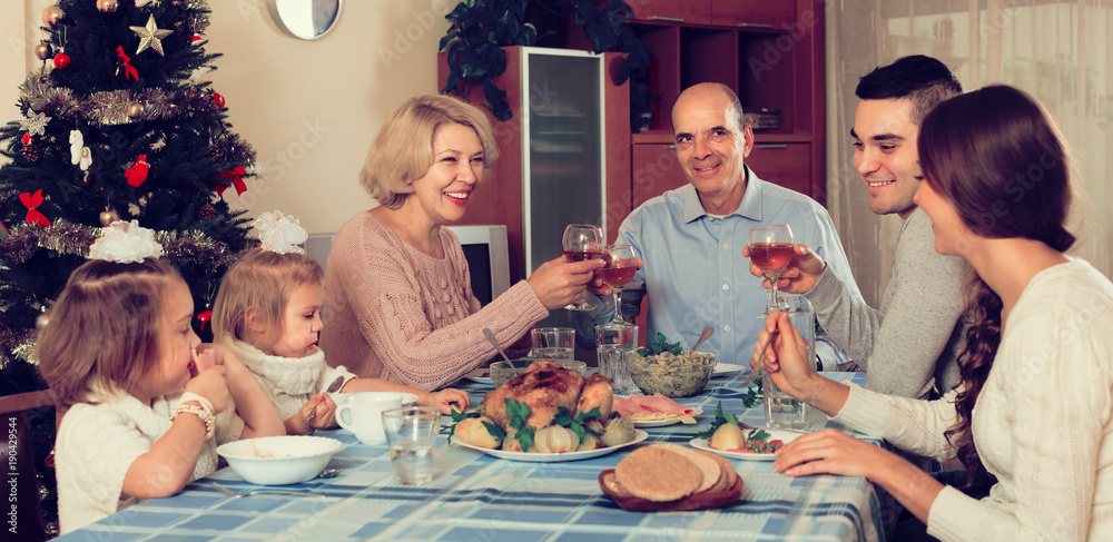 Fototapeta premium Christmas celebration in the bosom of family