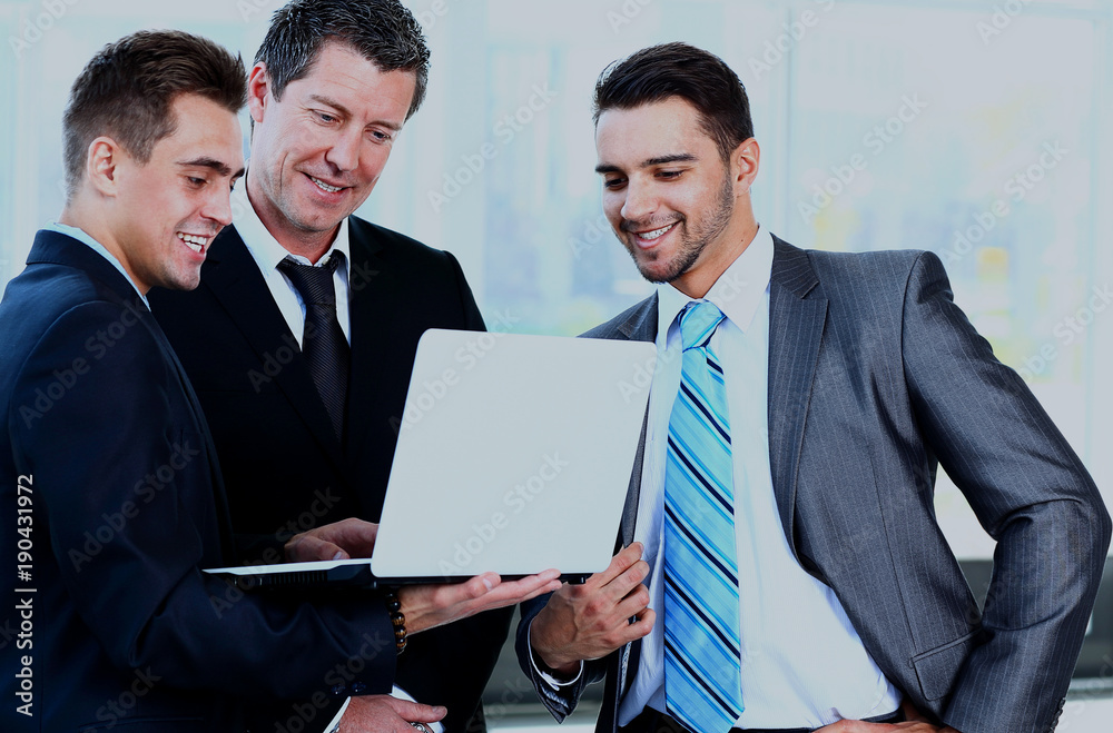 Business meeting - manager discussing work with his colleagues. Business meeting - manager discussing work with his colleagues.