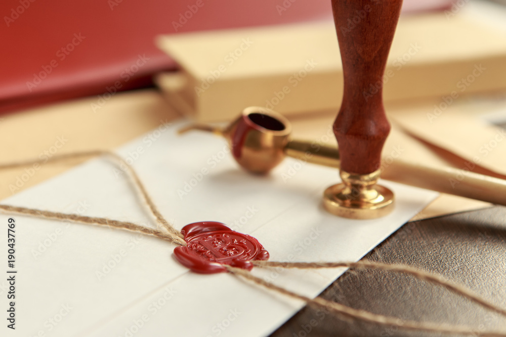 Notary's public pen and stamp on testament and last will. Notary public tools Notary's public pen and stamp on testament and last will. Notary public tools