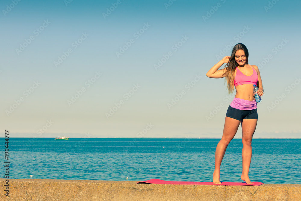 Woman drinking water after sport gym outdoor Woman drinking water after sport gym outdoor