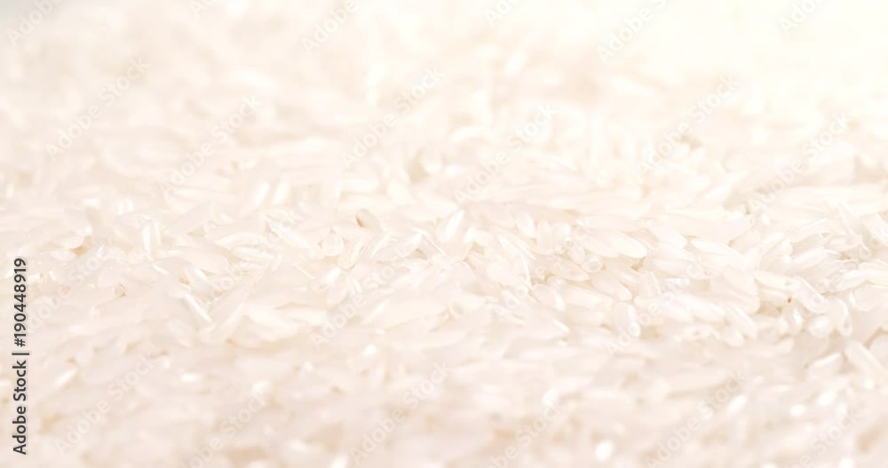 Spinning of uncooked white rice Spinning of uncooked white rice