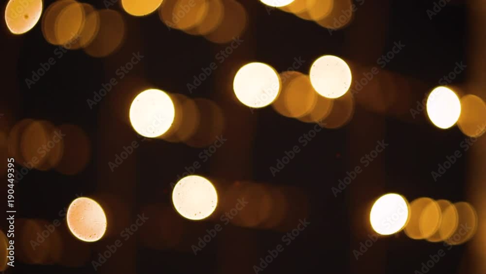 The abstraction lights in the defocus are extinguished and light up again
