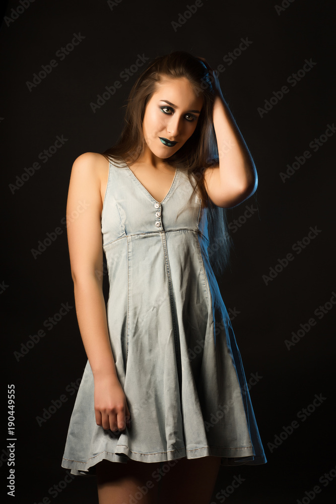 Amazing young woman with long hair and creative metallic makeup Amazing young woman with long hair and creative metallic makeup