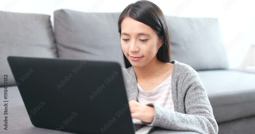 Woman using mobile phone for online shopping