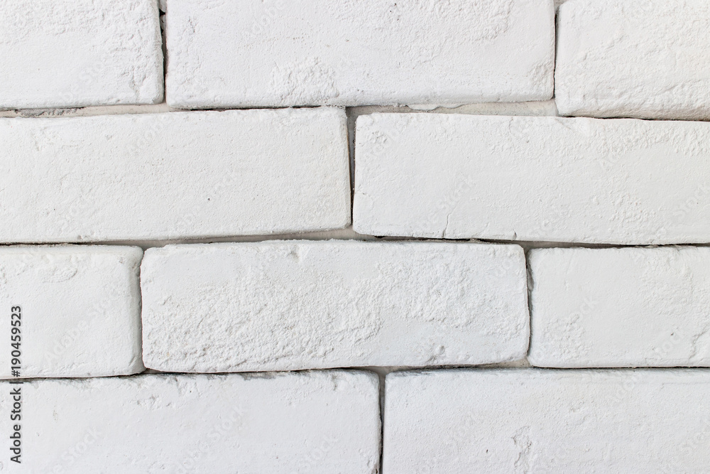 Naklejka premium White grunge brick wall background