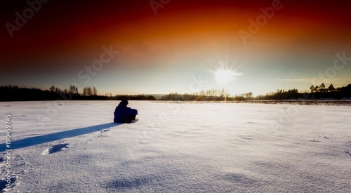 Man silhouette in tranquil winter landscape © milosz_g