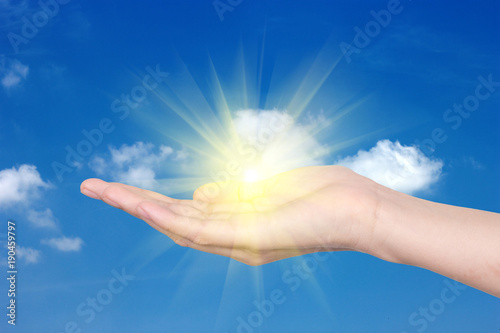 Hands with a bright sun