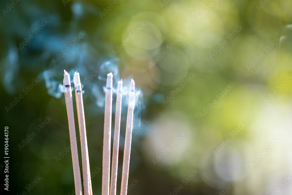 burning Embossed sticks and smoke from incense burning and smoke burning Embossed sticks and smoke from incense burning and smoke