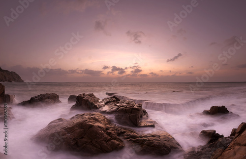 Dramatic sunrise view of Rocky Hang Rai beach, Vietnam
