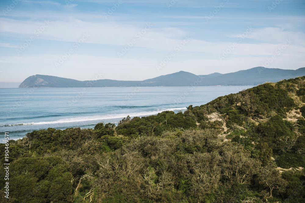View of Bruny Island beach in the afternoon.