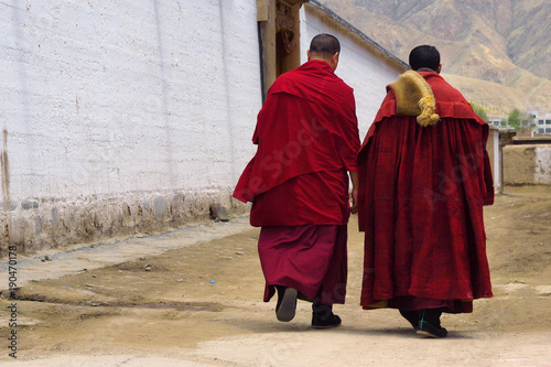 monks walking at labrang  monastery ,Xiahe,china © MICHEL