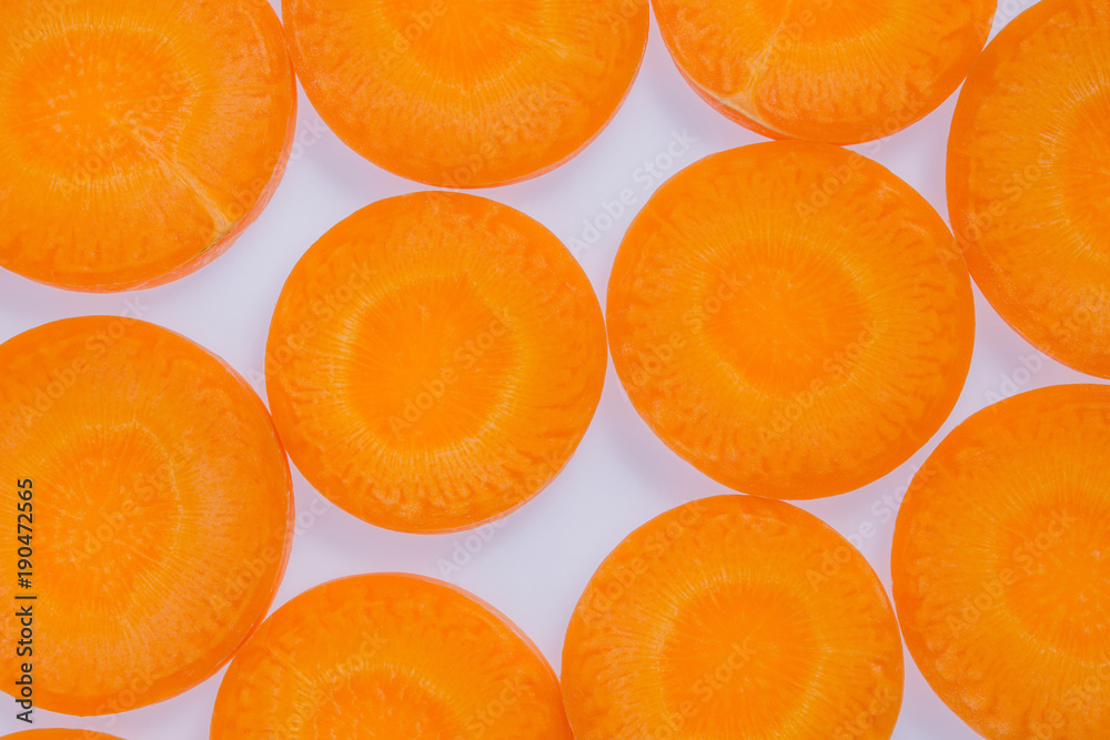 top view of fresh orange carrot slice background top view of fresh orange carrot slice background