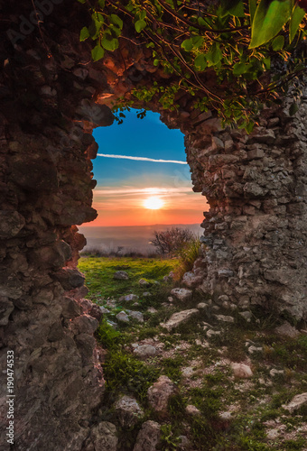 Fara in Sabina (Italy) - The sunset from 'Ruderi di San Martino', ruins of an old abbey, in province of Rieti beside Farfa Abbey, Sabina area, central Italy photo
