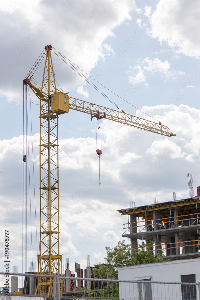 column crane near unfinished construction