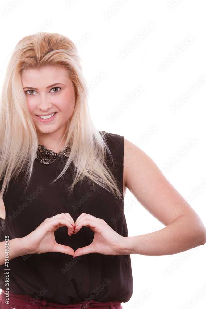 Blonde woman making heart symbol with hands Blonde woman making heart symbol with hands