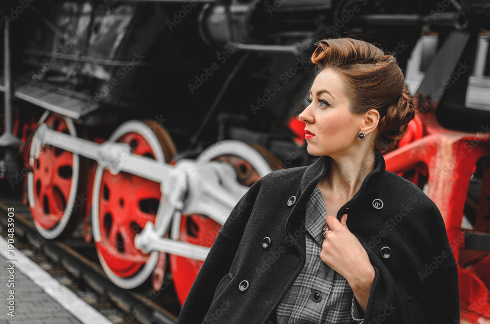 girl on the platform of the railway station girl on the platform of the railway station