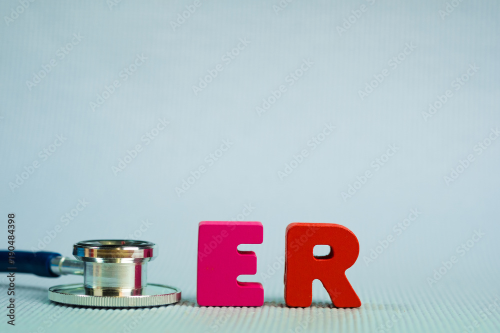 Text ER or emergency room alphabet with stethoscope, healthy and health care concept. Text ER or emergency room alphabet with stethoscope, healthy and health care concept.