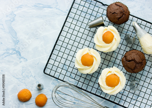 Easter egg cupcakes - chocolate cupcakes with cream cheese frosting and apricot for Easter