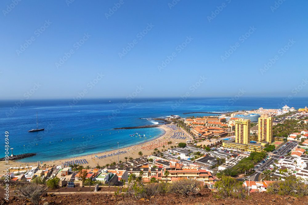 View of the beach and lagoon of Los Cristianos resort on Tenerife, Canary Islands, Spain