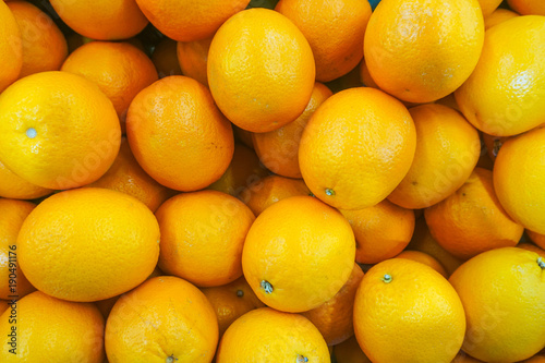 Pile of Fresh Navel Oranges are selling in supermarket