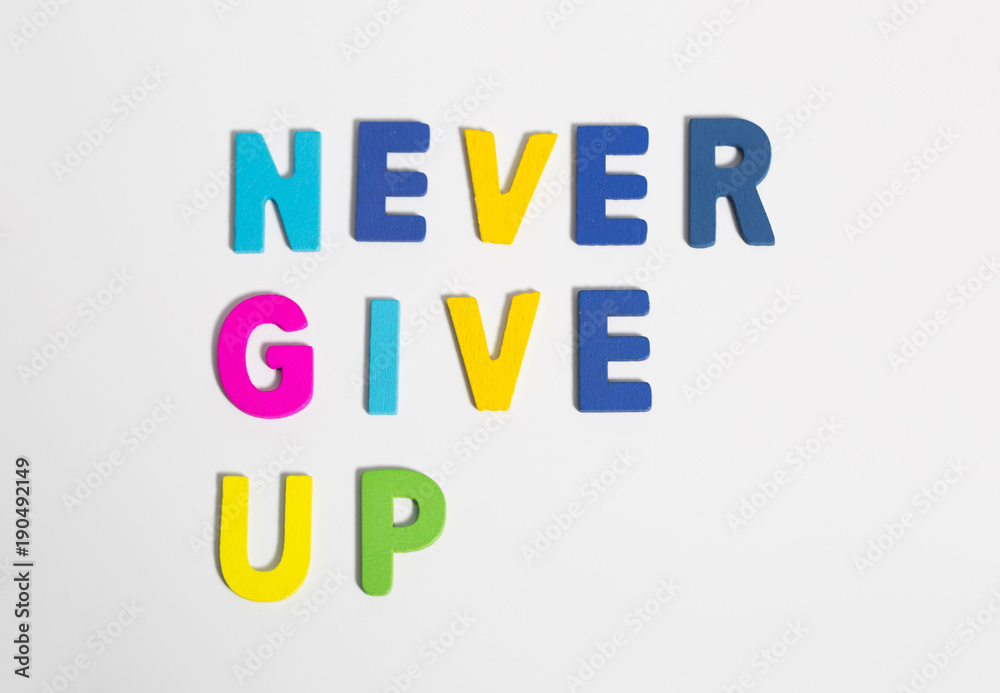 Phrase Never Give Up in colorful letters Phrase Never Give Up in colorful letters
