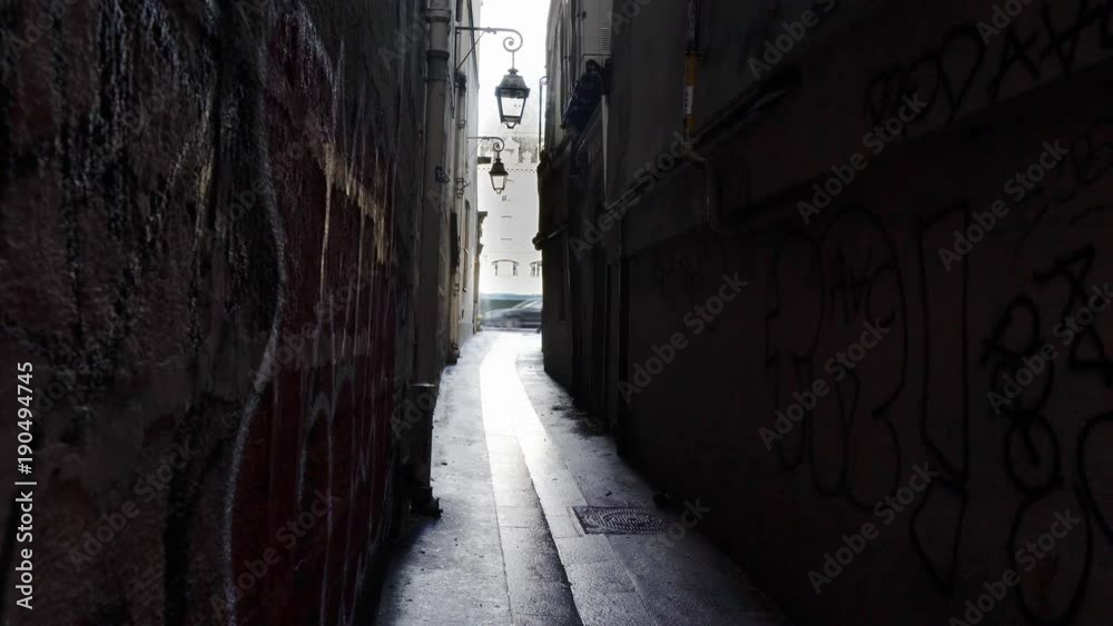 Paris,France-January 22, 2018: View of Rue du Chat qui Peche, the narrowest street in Paris, 26 meters long by 1.8 meters wide, from Rue de la Huchette. . 