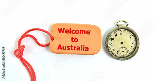 vintage clock and small clay plate with text welcome to australia © bellakadife