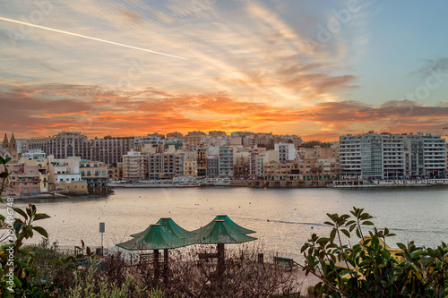 Sunset in St. Julians, popular Maltese resort and destination on Malta island. photo