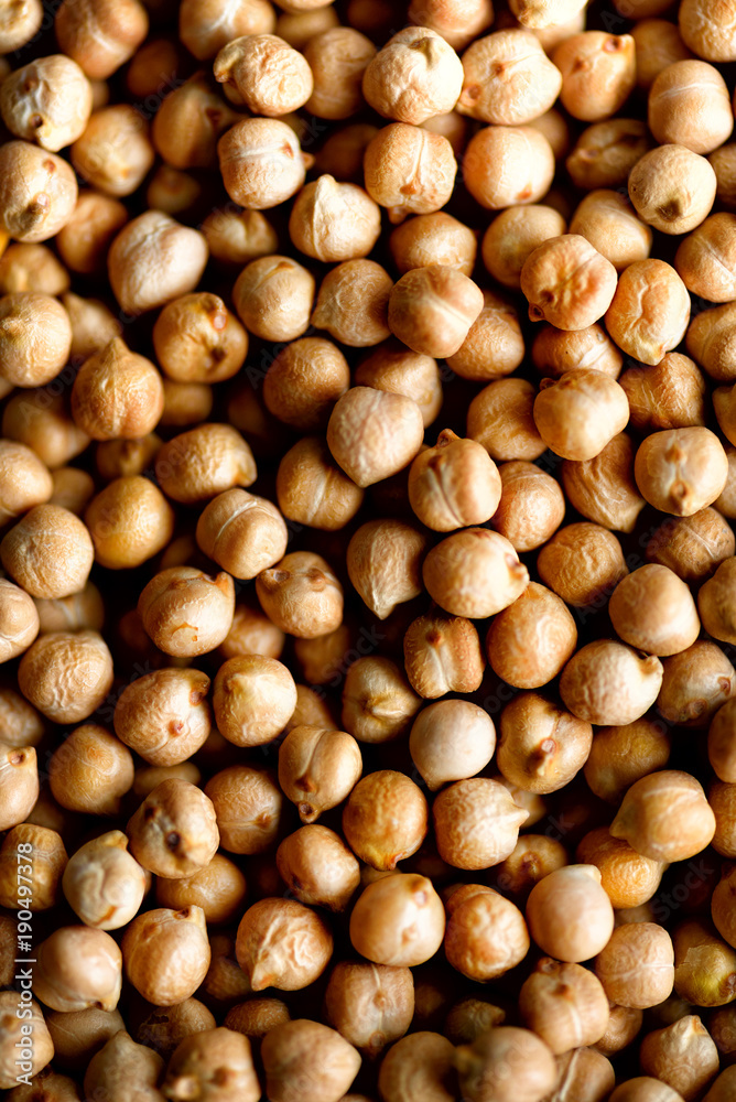 Raw organic dried chickpea texture background. Vegan healthy nutrition. Top view, copy space, healthy lifestyle concept. Raw organic dried chickpea texture background. Vegan healthy nutrition. Top view, copy space, healthy lifestyle concept.