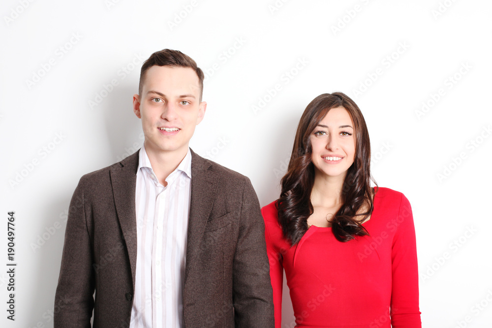 Happy Valentine's day photo shoot. Couple in love smiling wide, showing affection, sophisticated business casual style. 14th february, white background, copy space, front view portrait. Happy Valentine's day photo shoot. Couple in love smiling wide, showing affection, sophisticated business casual style. 14th february, white background, copy space, front view portrait.